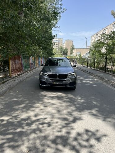 трос для машины: Серый матовый внедорожник BMW X5 м пакет Чорный диски обклейина