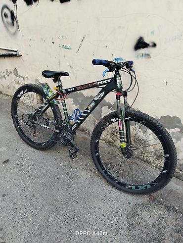 24 velosiped: NXT M-22 dağ velosipedi - Çərçivə: NXT M-22 alüminium çərçivə — 2