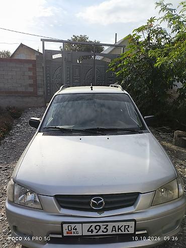 Mazda Demio: 2001 г., 1.5 л, Механика, Бензин, Универсал