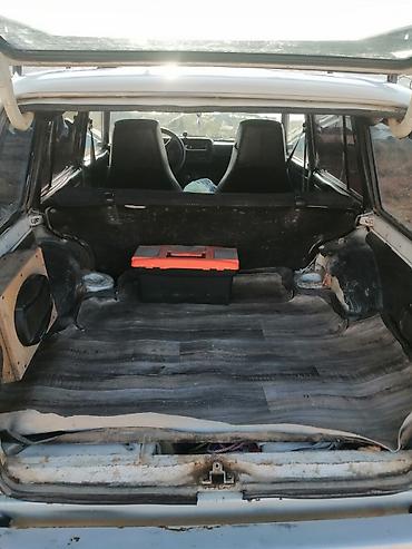 lada 012: VAZ 2104 universal, ağ rəng, arxaötürücülü. Xüsusiyyətlər: - Kuzov: 5 — 7