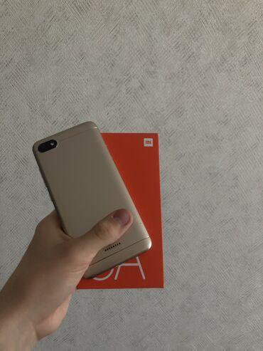 xiaomi qulaqciqlar: Xiaomi Redmi 6A, 2 GB, rəng - Ağ, 
 Sensor, İki sim kartlı, Face ID