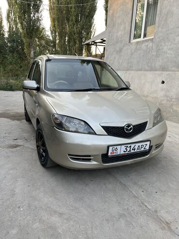 чехлы на ми: Mazda 3: 2003 г., 1.5 л, Автомат, Бензин, Хэтчбэк