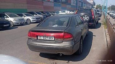 мазла: Mazda Cronos: 1992 г., 2 л, Механика, Бензин, Седан — 2