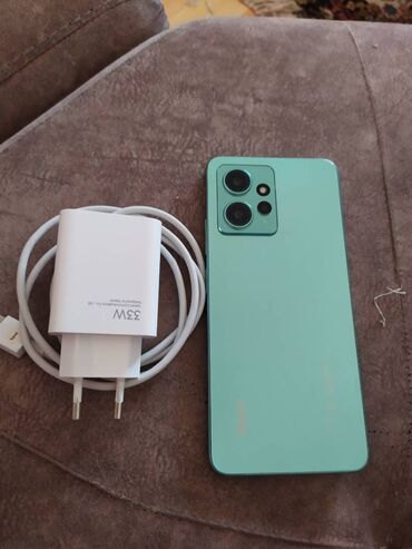 adapdır: Xiaomi 12, 128 ГБ, цвет - Зеленый, 
 Сенсорный, Отпечаток пальца, Две SIM карты