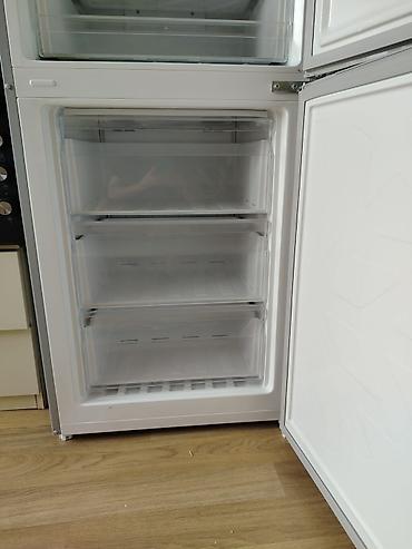 soyuducu lökbatan: İşlənmiş 2 qapılı Taube Soyuducu Satılır, rəng - Boz, Dispenserli — 2