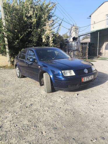 опель вектора б: Volkswagen Bora (седан), тёмно‑синий цвет кузова. Кузов/экстерьер: -