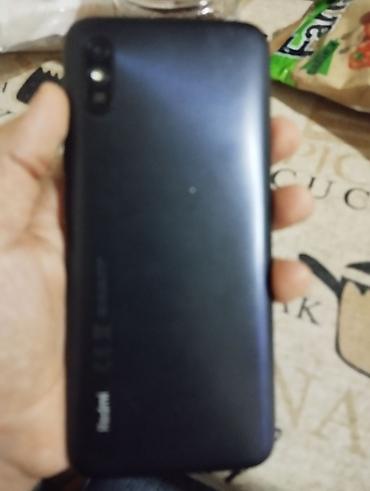 redmi pad: Xiaomi Redmi smartfon - Model: Redmi (arxa qapaqda “Redmi” loqosu) - — 1
