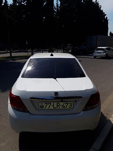 turbo az uvaz: Ağ rəngli sedan avtomobil Xarici: - Ağ gövdə, arxa park sensorları - — 1