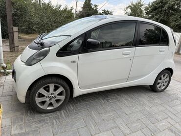 купить китайские электромобили: Электромобиль Citroen ZERO белого цвета, представляющий собой