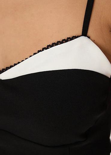 Digər qadın geyimləri: Qadın topu – iki rəngli - Model: nazik askılı, V-kəsimli. - Rəng — 2