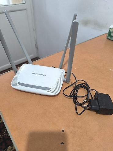mac mini 4: Wi‑Fi роутер Mercusys MW325R (N300) - Диапазон: 2.4 ГГц, скорость до — 2