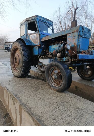 Traktorlar: Rolu silindir di bir təkəri zəifdi başqa heç bir problemi yoxdu