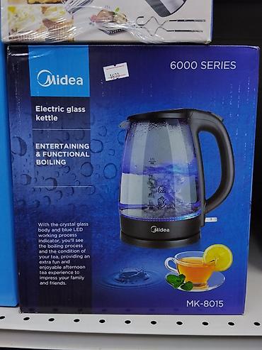 kitchen aid: Электрочайник Midea MK-8015 (серия 6000), стеклянный - Объем: 1,7 л - — 1