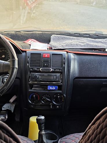 Транспорт: Hyundai Getz: 2004 г., 1.4 л, Механика, Бензин, Хэтчбэк — 6