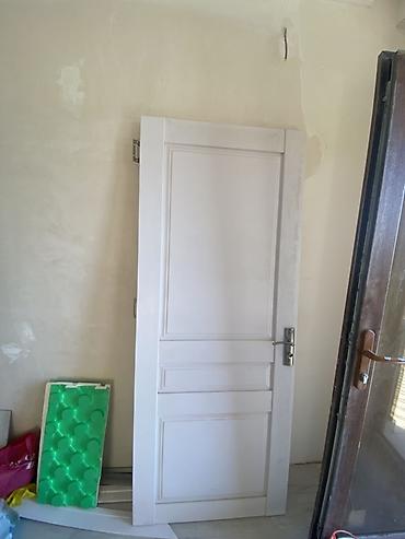 Ağ rəngli otaq qapısı - Material: MDF/taxta əsaslı, hamar boyalı səth