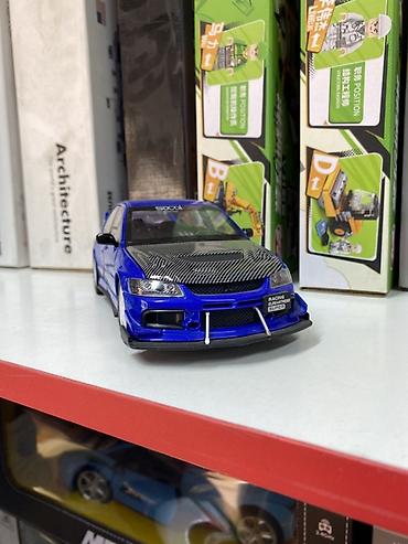 митси бутси: Коллекционная модель автомобиля в стиле Mitsubishi Lancer Evolution — 1