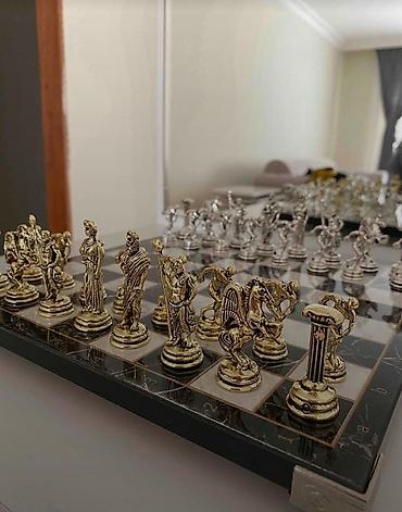 İdman oyunları: Cooper Chess – metal fiqurlu şaxmat dəsti •• 210azn alınıb. Fərqlilik — 4