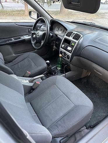 бампер на мазду 323: Mazda 323: 2002 г., 1.3 л, Механика, Бензин, Хэтчбэк — 7