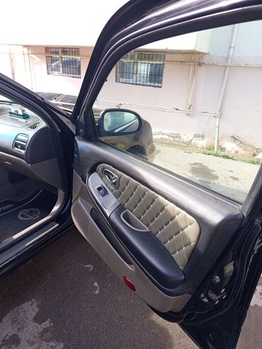 Nissan: Nissan Maxima: 3 l | 2002 il Sedan — 18