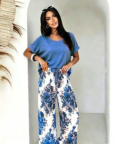ca deca: Ženski komplet – oversized majica i široke pantalone sa floralnim — 7