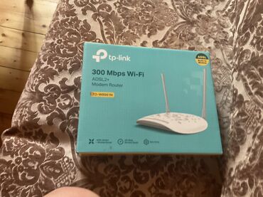 Noutbuk və netbuklar: Ağ rəngli TP-Link TD-W8961N model simsiz modem router. ADSL2+