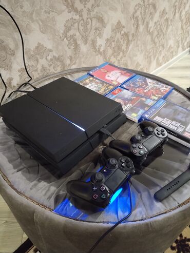 PS4 (Sony Playstation 4): Playstation 4 Fat,1 Tb yaddaş, 6 disk verilir,pultlari tam