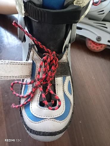 Roliklər: Uşaq üçün tənzimlənən inline konkis (rolik). 32-34 razmere gedir — 5