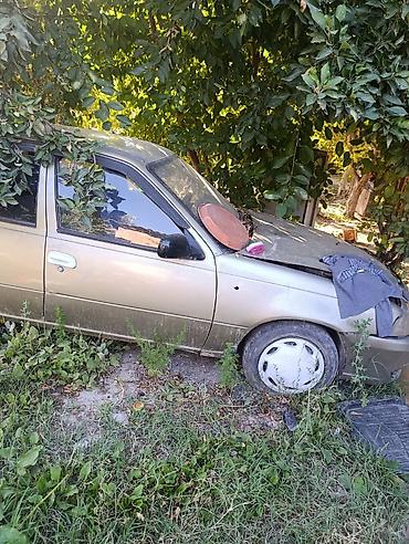 двери мазда кронос: Автомобиль седан золотистого цвета. Описание: - Кузов: 4-дверный — 1