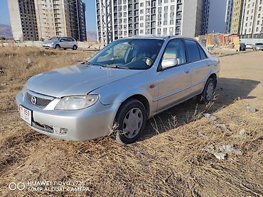forester 2004: Mazda Familia: 2000 г., Бензин, Седан — 1