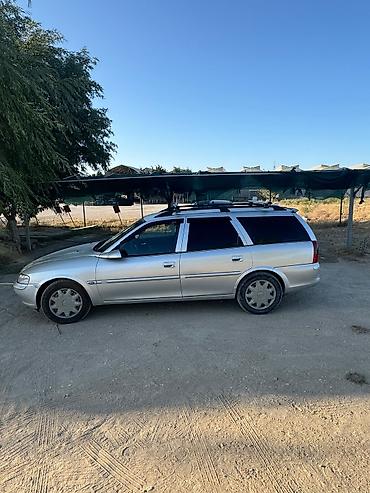авто фольксваген: Opel Vectra Caravan (Universal) – gümüşü rəng - Kuzov: universal (5 — 4