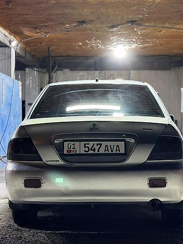 выхлопы: Mitsubishi Lancer: 2004 г., 1.6 л, Автомат, Бензин, Седан — 4