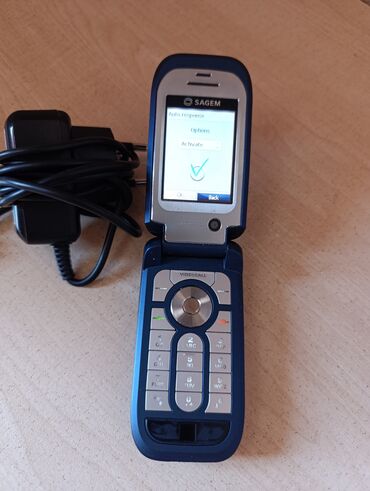 тачскрин на телефон fly: Sagem my901C model 
tam işlək vəziyyətdədir 
adapteri də var 
15azn