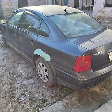 matoru vurub: Volkswagen Passat: 1.6 l | 1999 il Sedan — 1
