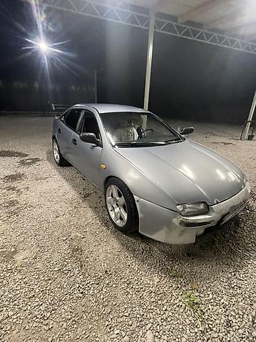 Унаа сатуу: Mazda Lantis: 1996 г., 1.6 л, Кол менен иштөөчү, Бензин, Седан — 4