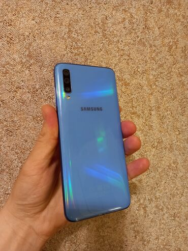 sq90 телефон: Samsung A70, 128 ГБ, цвет - Голубой, Отпечаток пальца
