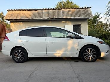 преви: Honda Insight: 2012 г., 1.3 л, Вариатор, Электромобиль — 3