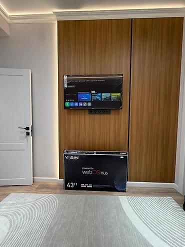 Телевизоры: Телевизор Smart TV с крупной диагональю (около 55–65"), тонкими — 61