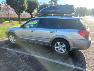 фара субару аутбек: Вместительный универсал Subaru Outback, оснащенный багажником на крыше