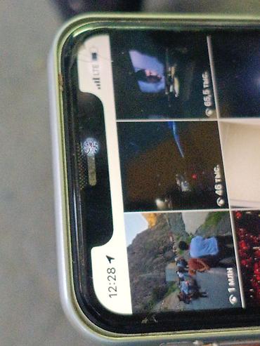 mini 5 pro: Смартфон с двойной основной камерой и вспышкой. На задней панели — — 3