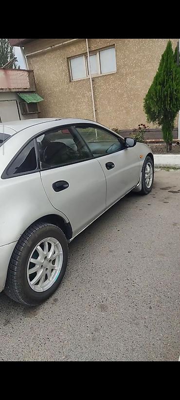 e34 2 5: Mazda 323: 1996 г., 1.5 л, Механика, Бензин, Лифтбек — 1