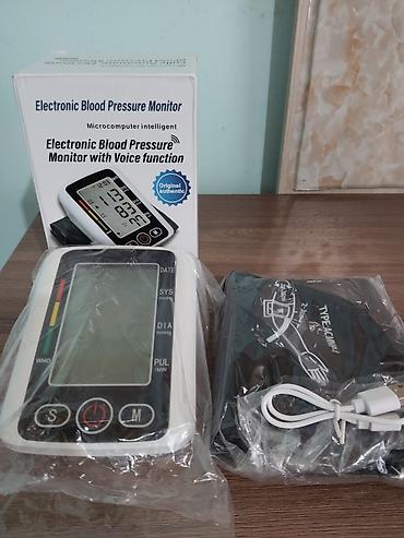 Тонометры: Təzyiq ölçən aparat həm batareya ilə işləyir həm də USB şnur ilə,rus — 5