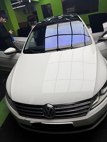 passat 2002: Volkswagen Passat CC – ağ rəngli, fastback kuzovlu 4 qapılı kupe — 2