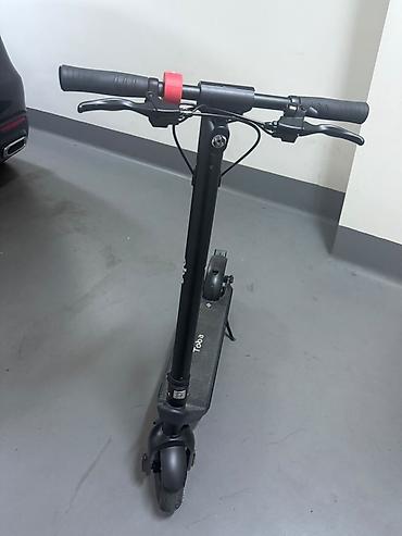 elektrikli scooter toba: Elektrikli skuter – Toba - Rəng: qara, yığcam və minimal dizayn - — 4