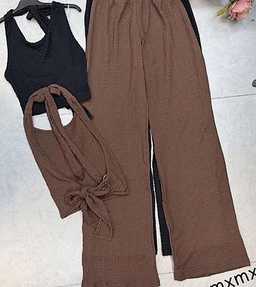 Kompleti: Ženski komplet – top bez rukava + široke pantalone. - Top: pripijena na lalafo.rs — 9 Kompleti: Ženski komplet – top bez rukava + široke pantalone. - Top: pripijena — 9