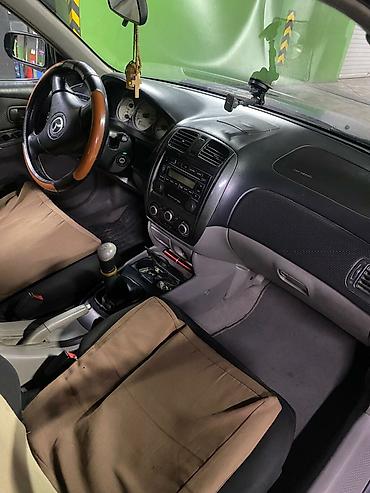 familia: Mazda Familia: 2000 г., Механика, Бензин, Хэтчбэк — 6