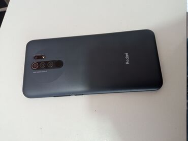 Xiaomi: Xiaomi Redmi 9, 32 GB, rəng - Boz, 
 Düyməli, Barmaq izi, İki sim kartlı