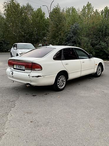 90: Mazda Cronos: 1993 г., 2 л, Механика, Бензин, Лифтбек — 4