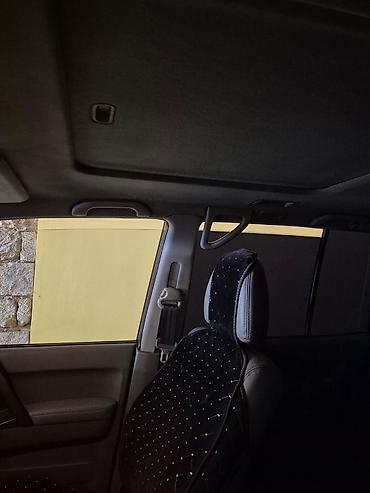 mitsubishi pajero 1995: Mitsubishi Pajero – tam çəkişli (4x4) SUV - Gümüşü rəng, kuzovda — 3
