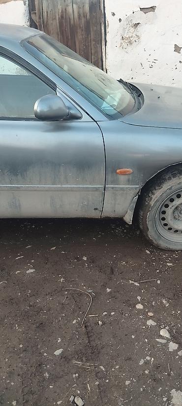 электро машине: Mazda 626: 1993 г., 1.8 л, Механика, Бензин, Седан — 3