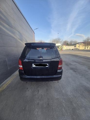 paneler: SsangYong Rexton, qara rəng, 5 qapılı SUV. Texniki və dizayn — 3